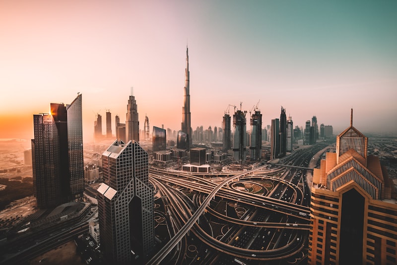 Dubai skyline with Burj Khalifa towering over the modern cityscape at dusk